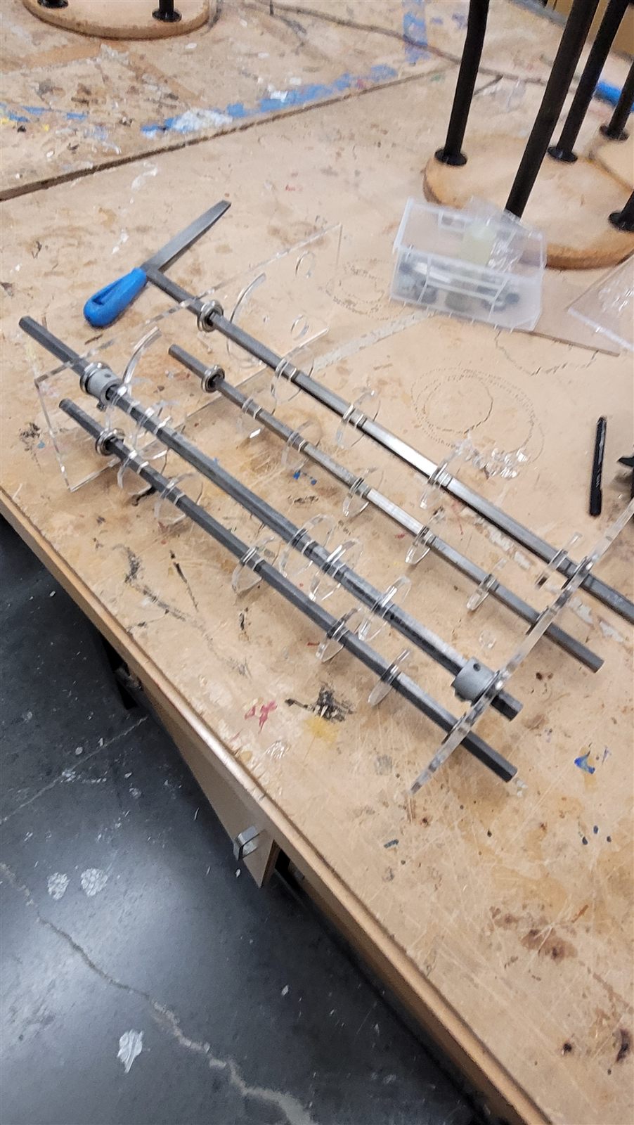 Intake frame with roller shafts on the workbench