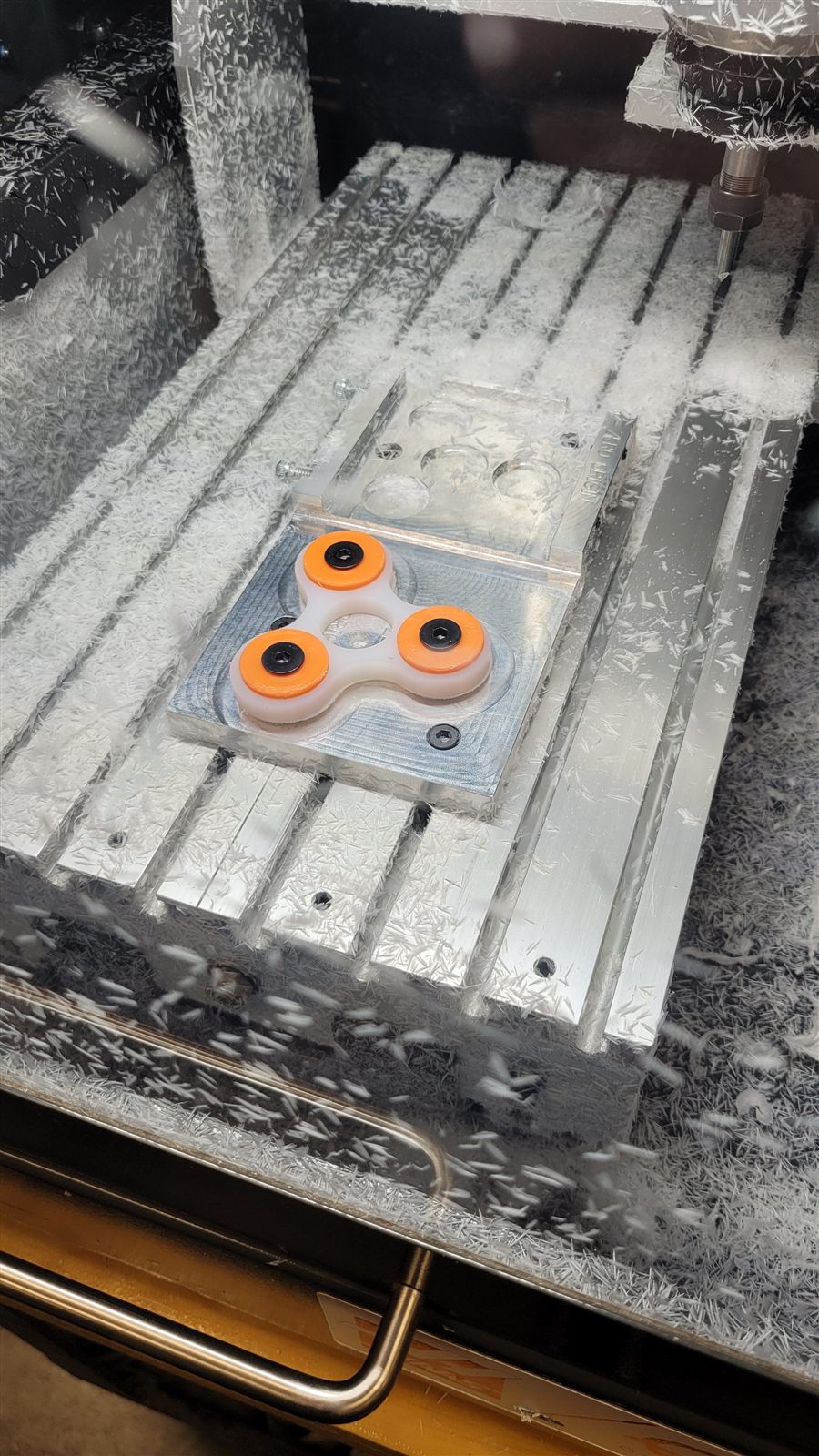 Close-up of the spinner in the fixture after machining
