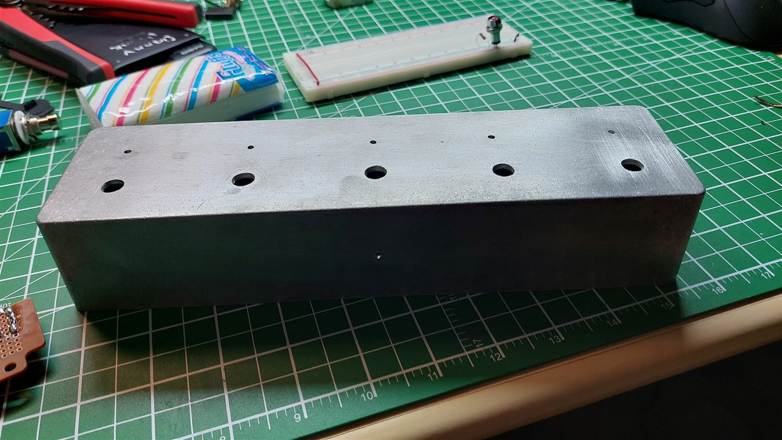 Aluminum enclosure drilled with five holes
