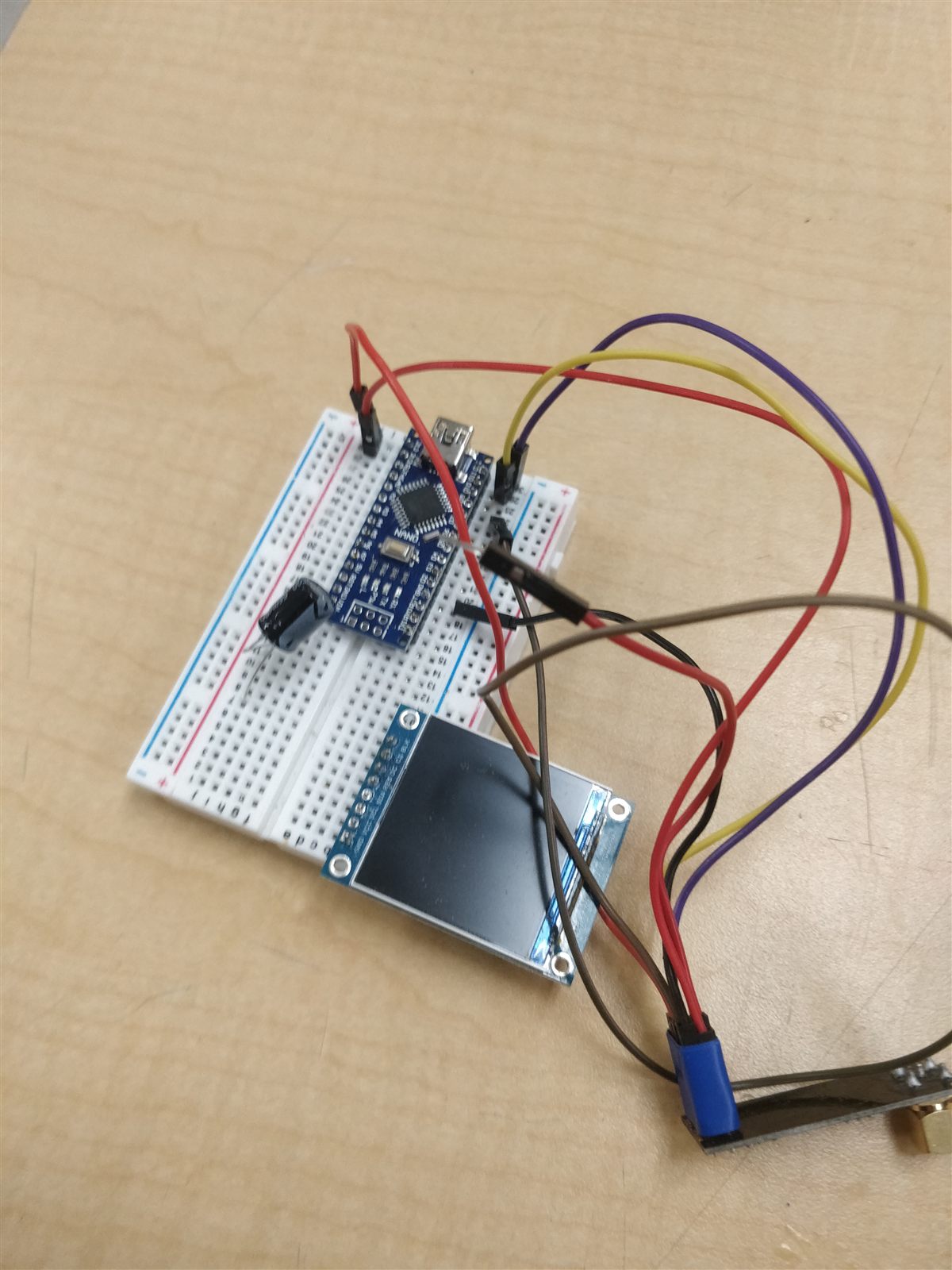 Controller prototype on a breadboard with a display