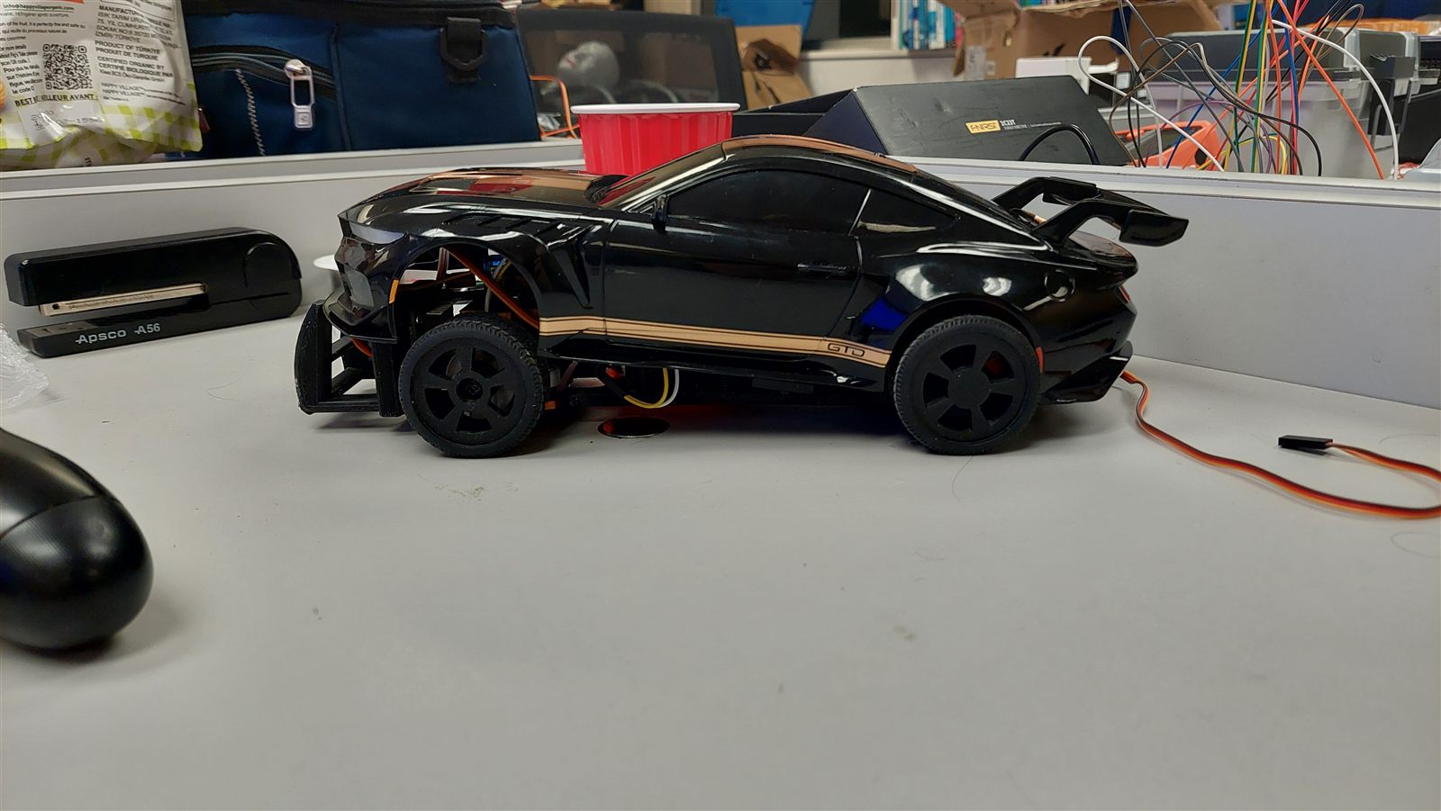 RC car on a lab bench during testing